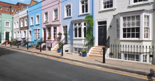 row-of colourful-houses-with-designer-doors