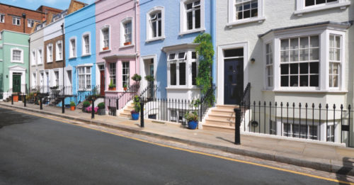 row-of-colourful-houses-with-designer-doors